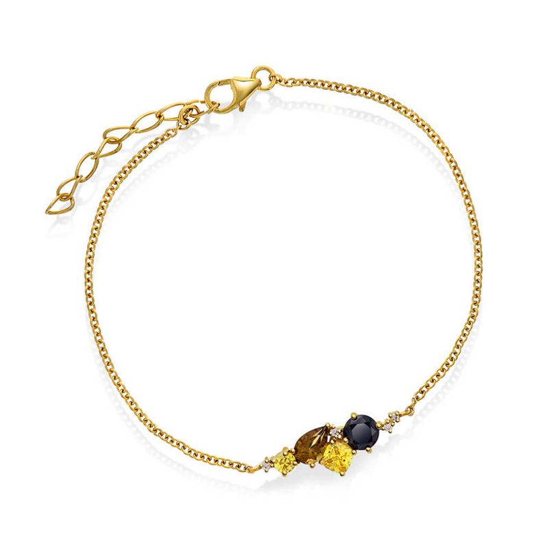 GLAM ARMBÅND MED GYLNE TONER